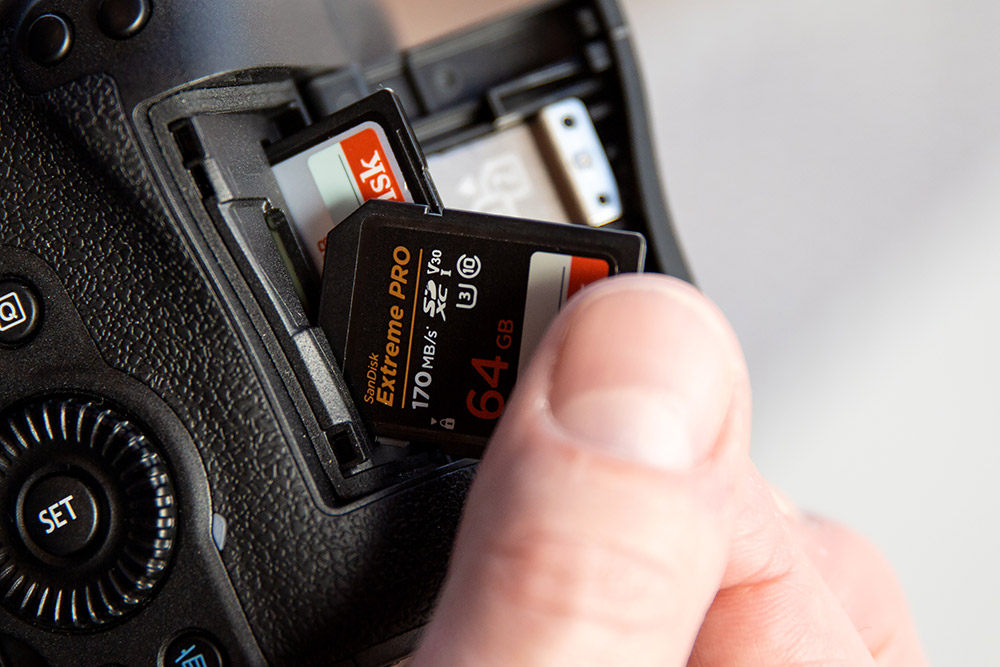inserting-card-to-camera-slot